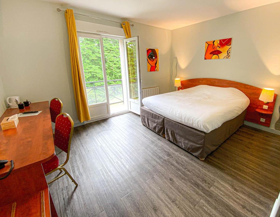 Logis Hotel - Restaurant Le Tulipier Vienne-le-Chateau Bagian luar foto